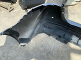 Bumper Trasero Nissan Versa Sedan 20-23