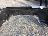 Bumper Trasero Nissan Versa Sedan 20-23
