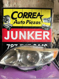 Foco delantero izq Toyota Corolla 09-10