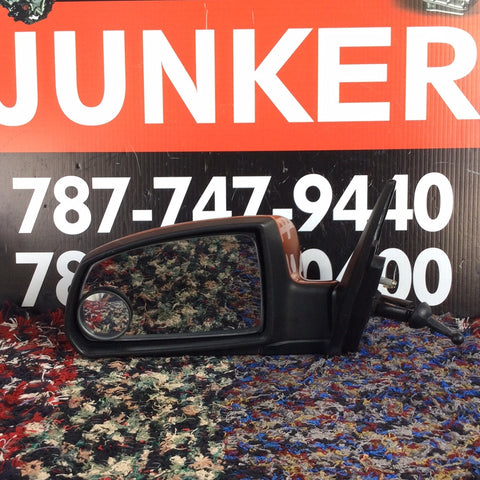 Retrovisor izq Kia Rio 09-11