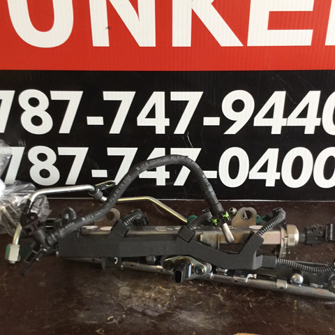 Flautas (arriba y abajo) e inyectores Toyota Corolla 21-23