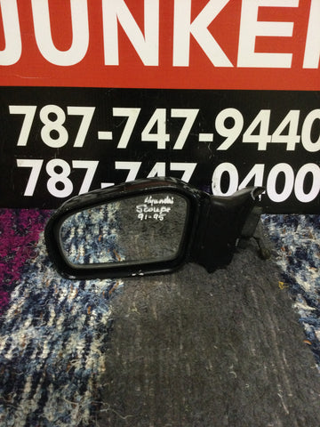 Retrovisor izq Hyundai Scoupe 91-95