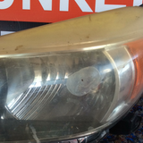 Foco Delantero izq Toyota Yaris HB 12-14