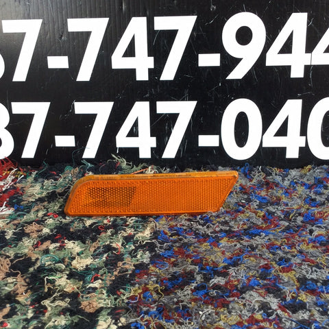 Reflector izq Ford Transit Connect 10-13