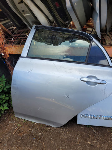 Puerta Trasera Izq. Toyota Corolla 09-13