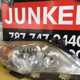 Foco delantero der Toyota Corolla Sedan 11-13