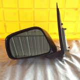 Retrovisor izq Nissan Frontier 05-19