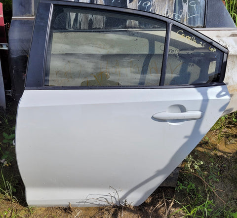 Puerta trasera izq Toyota Corolla 20-22